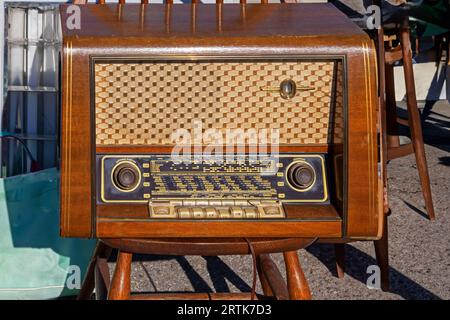 Old retro analogue vintage radio sold on flea market outdoors Stock Photo
