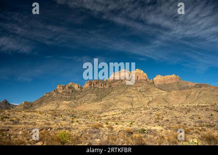 Crown Mountain Under Deep Blue Sky and Wispy Clouds in Big Bend Stock Photo