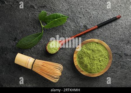 Flat lay composition with green matcha powder on grey table Stock Photo