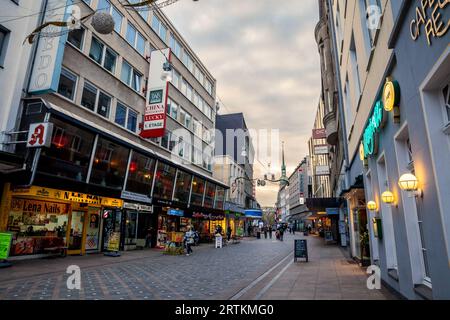 Picture of Ostenhellweg with stores and shops on a saturday afternoon in Dortmund, Germany. Ostenhellweg is the main shopping street in Dortmund, Germ Stock Photo