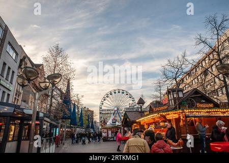 Picture of stands in Duisburg Christmas market, also called weihnachtsmarkt, in winter, in Germany. Stock Photo