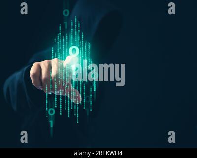 Hacker is pointing his finger at a group of zeros on a dark background. Concept of information security in internet networks and espionage. Stock Photo