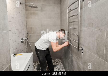 Installing towel rack discount on tile wall