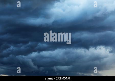 Thunderstorm clouds in cloudy dark skies Stock Photo