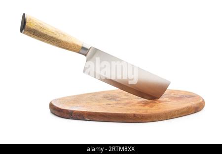 A knife stuck in a cutting board isolated on the white background. Stock Photo