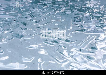 Cold water and ice cubes melting background. Global warming or climate change concept. Cold therapy, breathing techniques, Wim Hof Method, meditation Stock Photo