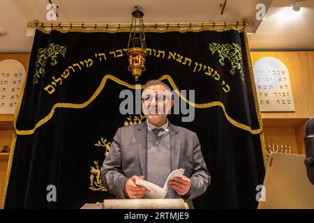 Purim celebration in Beth Yaacov synagogue, Paris, France. Rabbi Gabriel Farhi Stock Photo