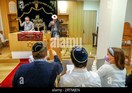 Purim celebration in Beth Yaacov synagogue, Paris, France. Stock Photo