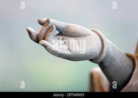 Tinh That Quan Am Pagoda.  Bodhisattva Avalokiteshvara. Guanyin ( Quan Am) Statue. The Goddess of Mercy and compassion. Marble statue.  Close up on ha Stock Photo