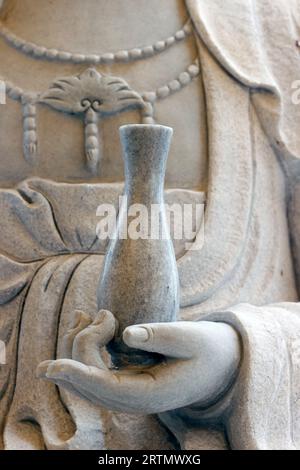 Tinh That Quan Am Pagoda.  Bodhisattva Avalokiteshvara. Guanyin ( Quan Am) Statue. The Goddess of Mercy and compassion. Marble statue.  Close up on ha Stock Photo