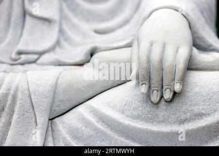 Tinh That Quan Am Pagoda.  Bodhisattva Avalokiteshvara. Guanyin ( Quan Am) Statue. The Goddess of Mercy and compassion. Marble statue.  Close up on ha Stock Photo