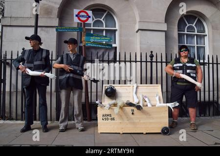 London, England, UK. 13th Sep, 2023. Activists holding ''arms'' stage an anti-weapons and anti-war protest in Whitehall as the Defence and Security Equipment International (DSEI) arms fair takes place in Excel Centre in east London. (Credit Image: © Vuk Valcic/ZUMA Press Wire) EDITORIAL USAGE ONLY! Not for Commercial USAGE! Stock Photo