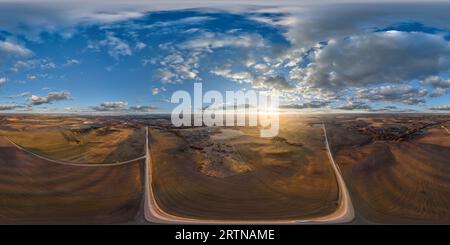 360 degree panoramic view of aerial full seamless spherical hdri 360 panorama view from great height above fields in countryside in equirectangular projection.  use like sky repla