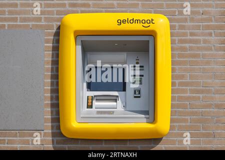 Geldmaat logo on ATM. Geldmaat is a Dutch company that installs, manages and maintains ATMs and is a joint venture of ABN AMRO, ING and Rabobank Stock Photo