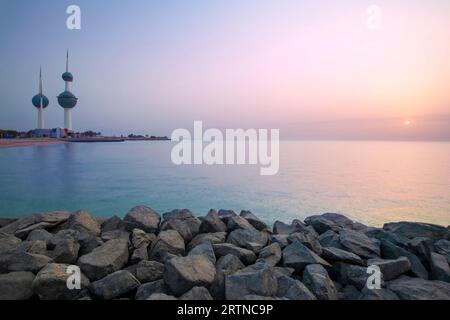 View of the Kuwait skyline - with the best known landmark of Kuwait City - during sunrise. Kuwait City view at early morning Stock Photo