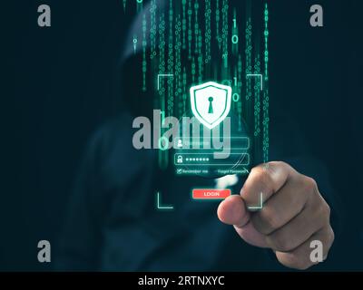 Hacker standing holding a magnifying glass with login screen On a dark background. Concept of information security in internet networks and espionage. Stock Photo