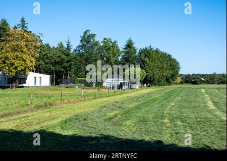 Essen, Antwerp Province, Belgium, September 9, 2023 - Agriculture field and sheds at the countryside around the Dutch Flemish border Stock Photo