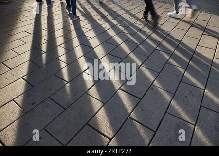 Stone Pavement Walking People Shadows Stock Photo - Alamy