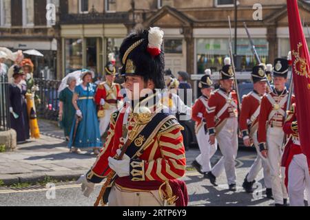 Parade of people dressed in period costume from the Georgian era as part of the annual Jane Austen festival in Bath in Somerset, United Kingdom Stock Photo