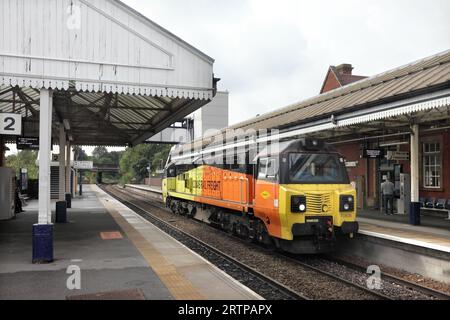 Colas Rail Freight Class 70 diesel loco 70808 passes through Scunthorpe station as the 0E32 1039 Crewe - Barnetby light engine movement on 14/9/23. Stock Photo