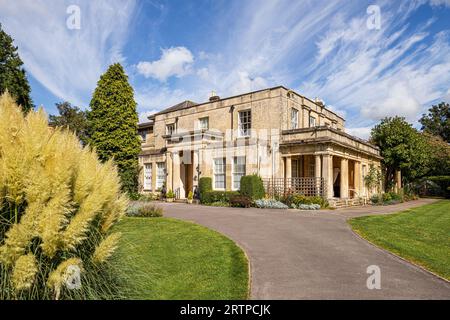 Watermoor House built of ashlar limestone in 1827 (now a care home) in the Cotswold town of Cirencester, Gloucestershire, England UK Stock Photo