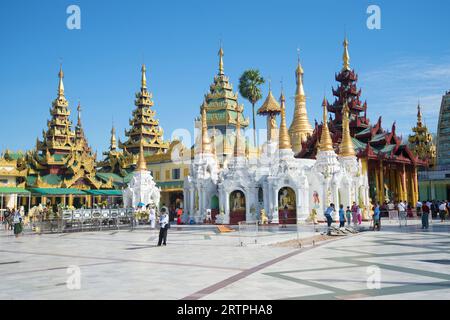 YANGON, MYANMAR - DECEMBER 17, 2016: Sunny day on the territory of Shwedagon pagoda Stock Photo
