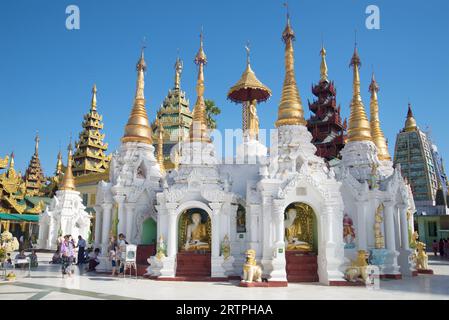 YANGON, MYANMAR - DECEMBER 17, 2016: One of the temples of the Shwedagon pagoda on a sunny day Stock Photo