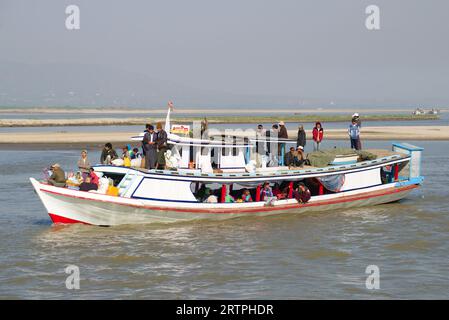 MANDALAI, MYANMA - DECEMBER 21, 2016: Passenger boat with passengers on the Irrawaddy river Stock Photo