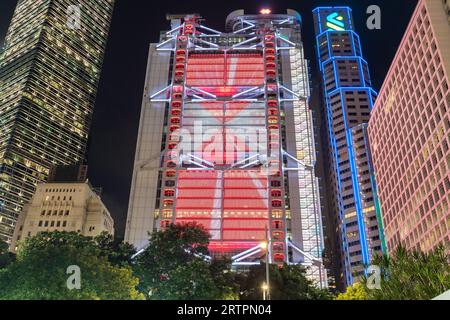 HSBC bank building in Central Hong Kong illuminated at night. Hong Kong - 27th August 2023 Stock Photo