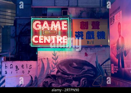 Game Centre red and green neon light sign at night. Hong Kong - 27th August 2023 Stock Photo