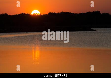 Sunset over Purcell City Lake, Oklahoma Stock Photo