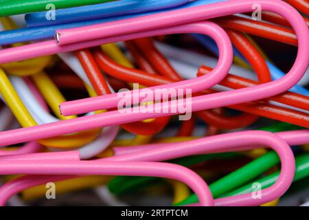 Abstract background of multicolored paper clips Stock Photo