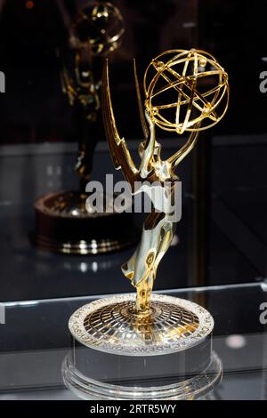 An Emmy award statuette in a display case. National Academy of Television Arts and Sciences trophy Stock Photo