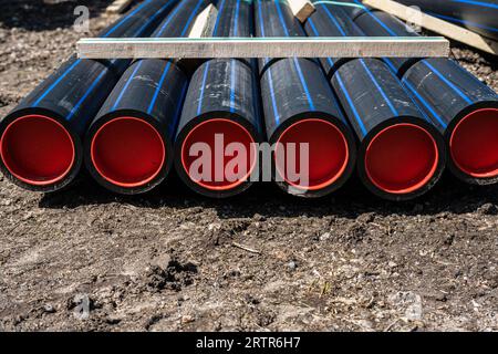 Six large water pipes in a stack Stock Photo - Alamy