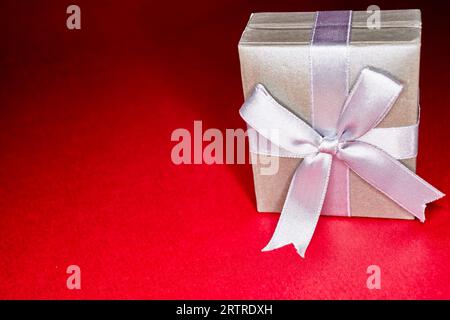 Various Gift Boxes with Ribbon and Bows isolated on Red Stock Photo