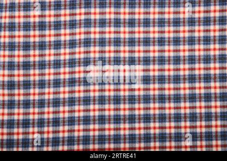 plaid flannel fabric. tartan texture background. shirt fabric with a checkered pattern. factory material. tartan texture background Stock Photo