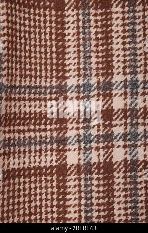 Classic tweed, Wool Background Texture. Coat close-up. Expensive suit fabric. Glenurquhart check is made of woolen fabric with a woven twill design of Stock Photo