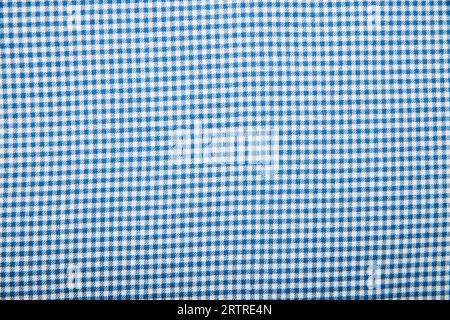 Fabric.Checkered fabric. Checkered pattern. Material for clothing. The texture of the binding gingham fabric. textile background. Fabric plaid. Close- Stock Photo