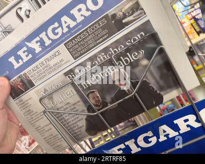 Paris, France - Feb 21, 2023: Front page of Le Figaro showcases President Zelensky and Biden on Ukraine Stock Photo