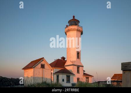 WA23633-00...WASHINGTON - The abandoned Point Wilson lighthouse at sunset in Fort Worden State Park. Stock Photo