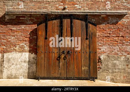 WA23626-00...WASHINGTON - Solid doors on an empty building on the shores of Port Townsend Bay in the town of Port Townsend. Stock Photo