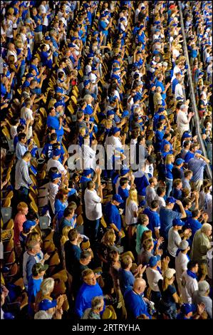 Fans at Dodger stadium dressed in Dodger Blue give a standing ovation to the team during a game of Major League Baseball in Los Angeles, CA, USA. Stock Photo