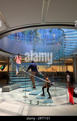 Shanghai, China - June 1, 2018: Glass spiral staircase of Shanghai Lujiazui Apple Store, Shanghai, China Stock Photo