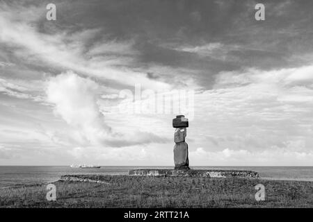 Black and white photo of a moai statue at Ahu Tahai on Easter Island in Chile Stock Photo