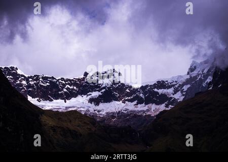 Snow covers the glacier at El Altar Volcano in the Andes near Banos, Ecuador. The Andean landscape near Banos in Ecuador features volcanic glaciers Stock Photo