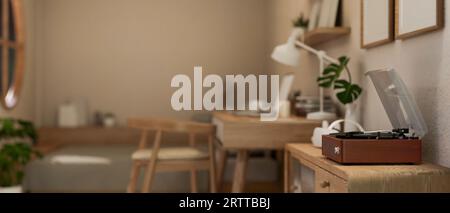 A vintage record player on a wooden cabinet in a cozy Scandinavian bedroom. close-up side view image. 3d render, 3d illustration Stock Photo