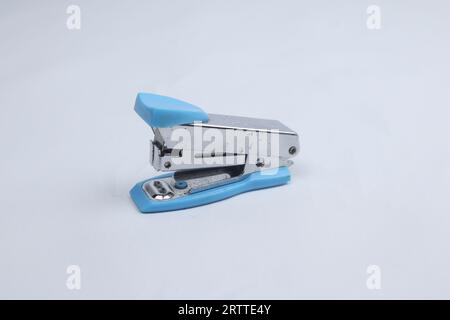 Blue stapler isolated on a white background Stock Photo