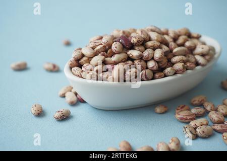 Closeup of brown soy beans in a bowl on table  Stock Photo