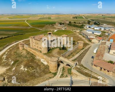 Aerial view of medieval Almenar castle near Soria Spain, four round towers protect the inner courtyard, surrounded by fortified outer walls Stock Photo
