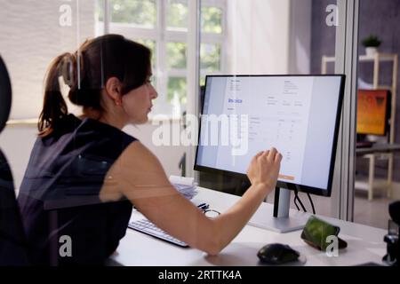 E Invoice Business Management. Accountant Using Electronic Invoice Stock Photo